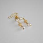 Ivory Pearl And Gold Stardust Drop Earrings..