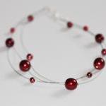 Floating Multi Strand Illusion Necklace In Red..